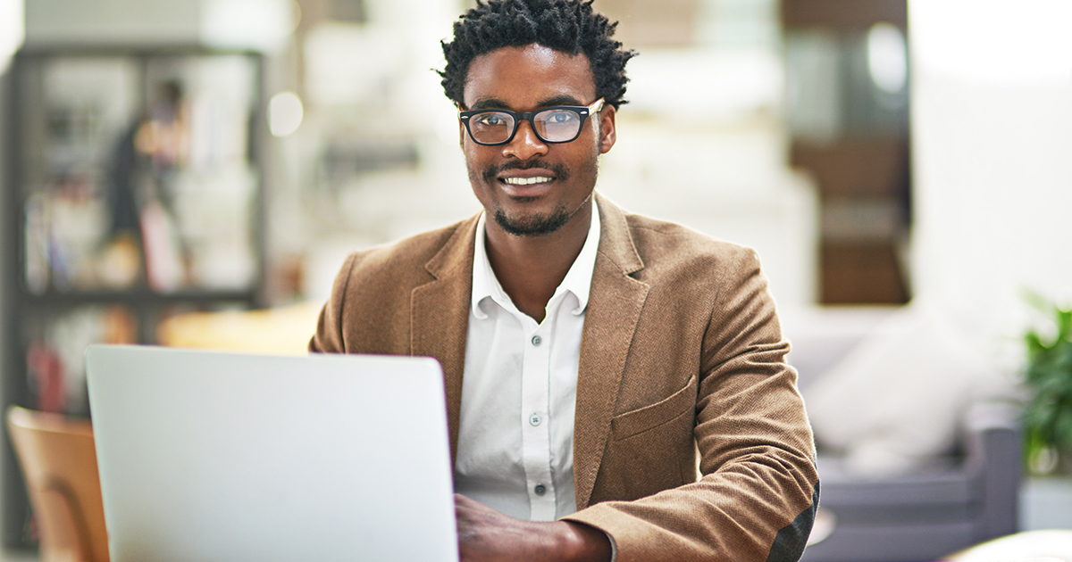 Man Busy on his Laptop